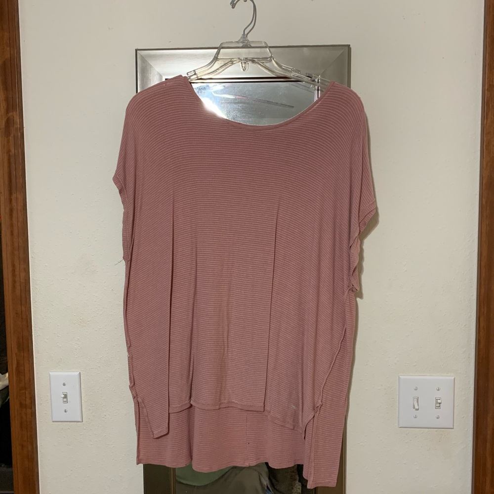 Large pink high low shirt